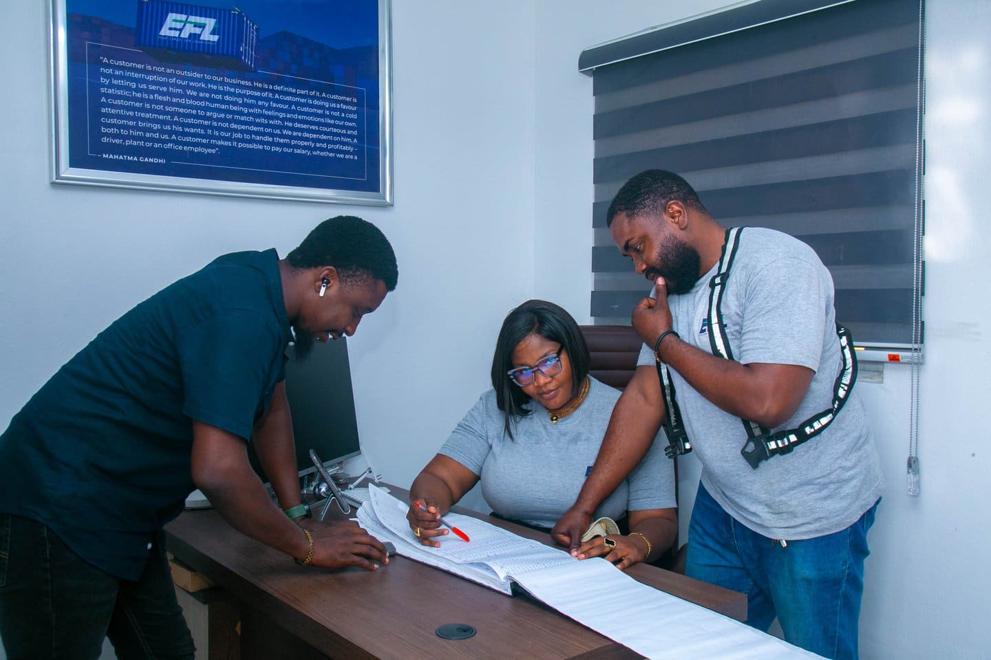 An EFL team reviewing shipment manifests in the Ikorodu office